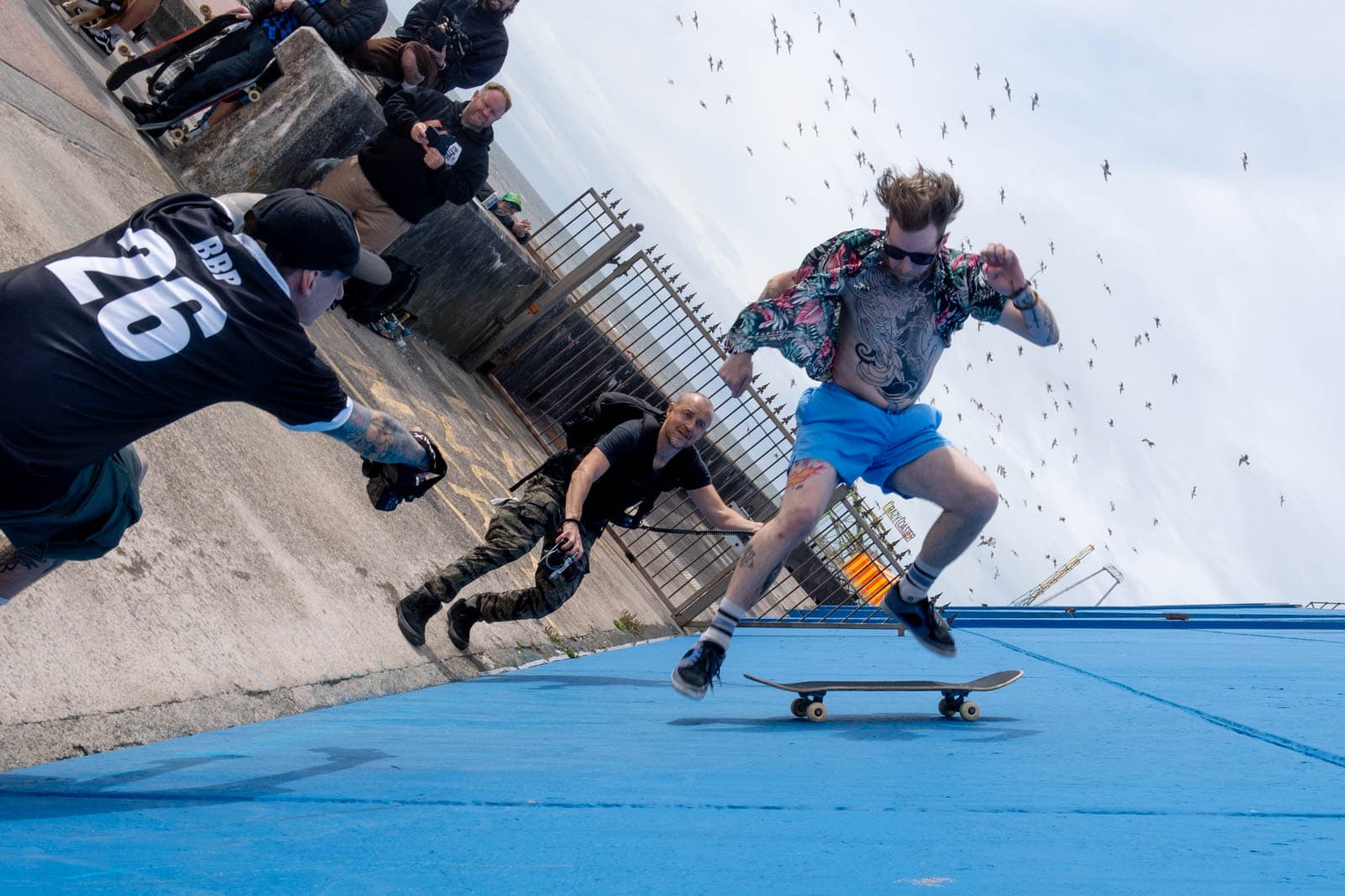A stylised view of a skater mid-trick