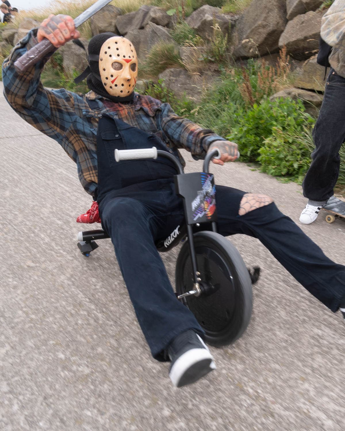 Skater in fancy dress rides the hillbomb downhill