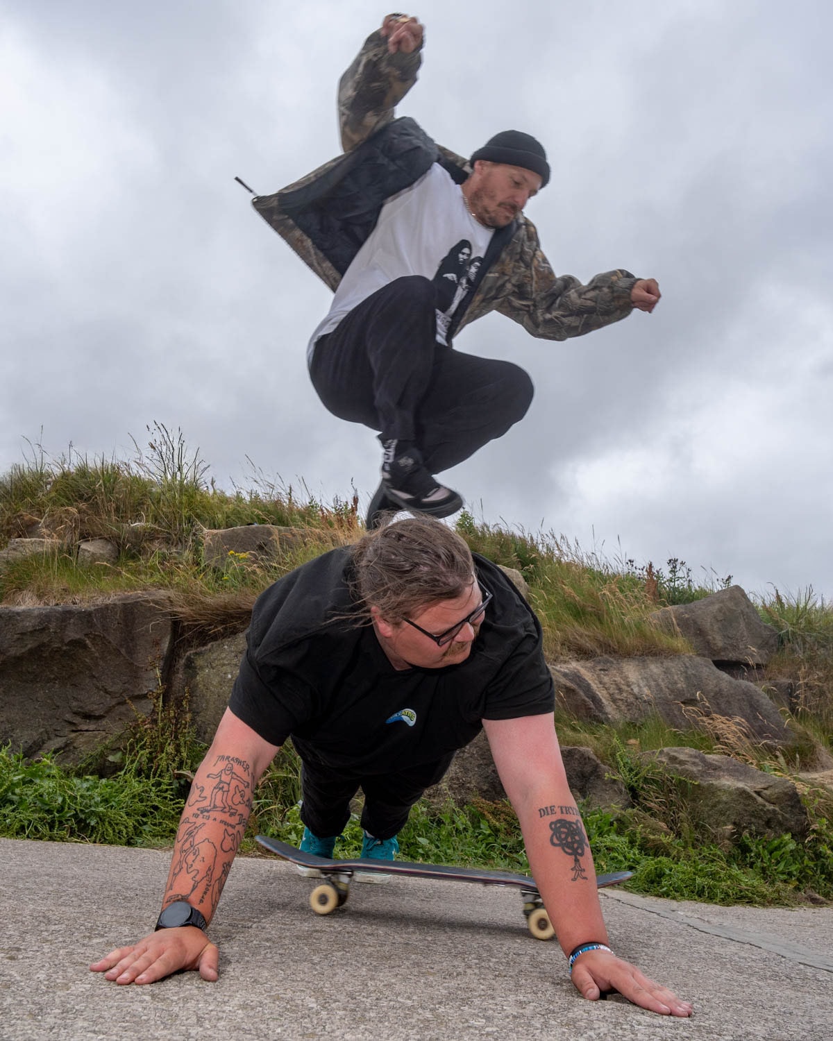 Skaters perform stunt jumping over each other